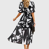 Joyce | Robe Midi Fleurie Flatteuse