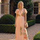 Calista | Robe longue plissée à manches courtes et col en V à imprimé floral