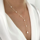 Collier avec pendentifs vintage et perles